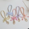 Original design 2025 Spring/Summer new striped bow keychain cute girl candy-colored mobile phone wrist strap Specification image